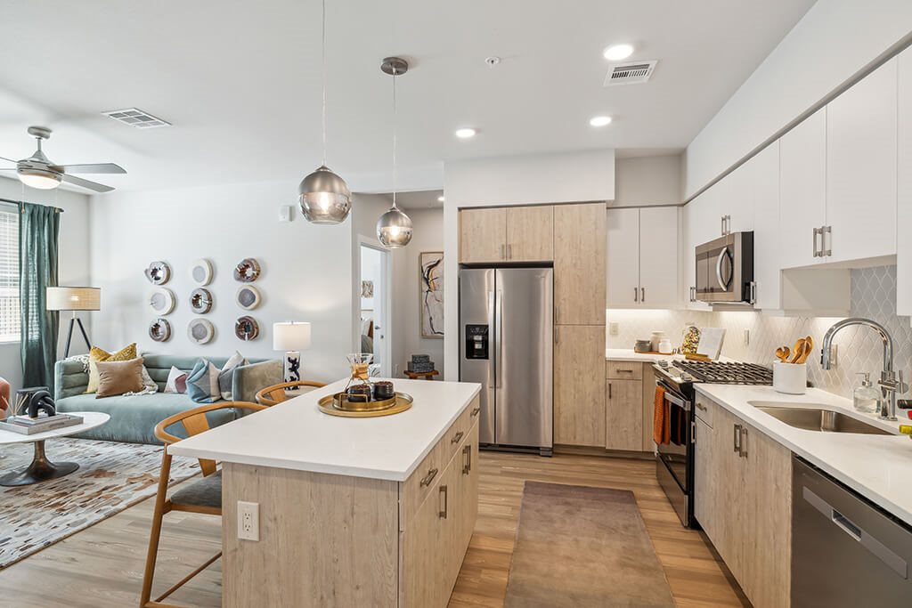 Kitchen with wood cabinets at The Braydon Apartments in Napa CA